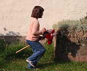 child on a hobby horse